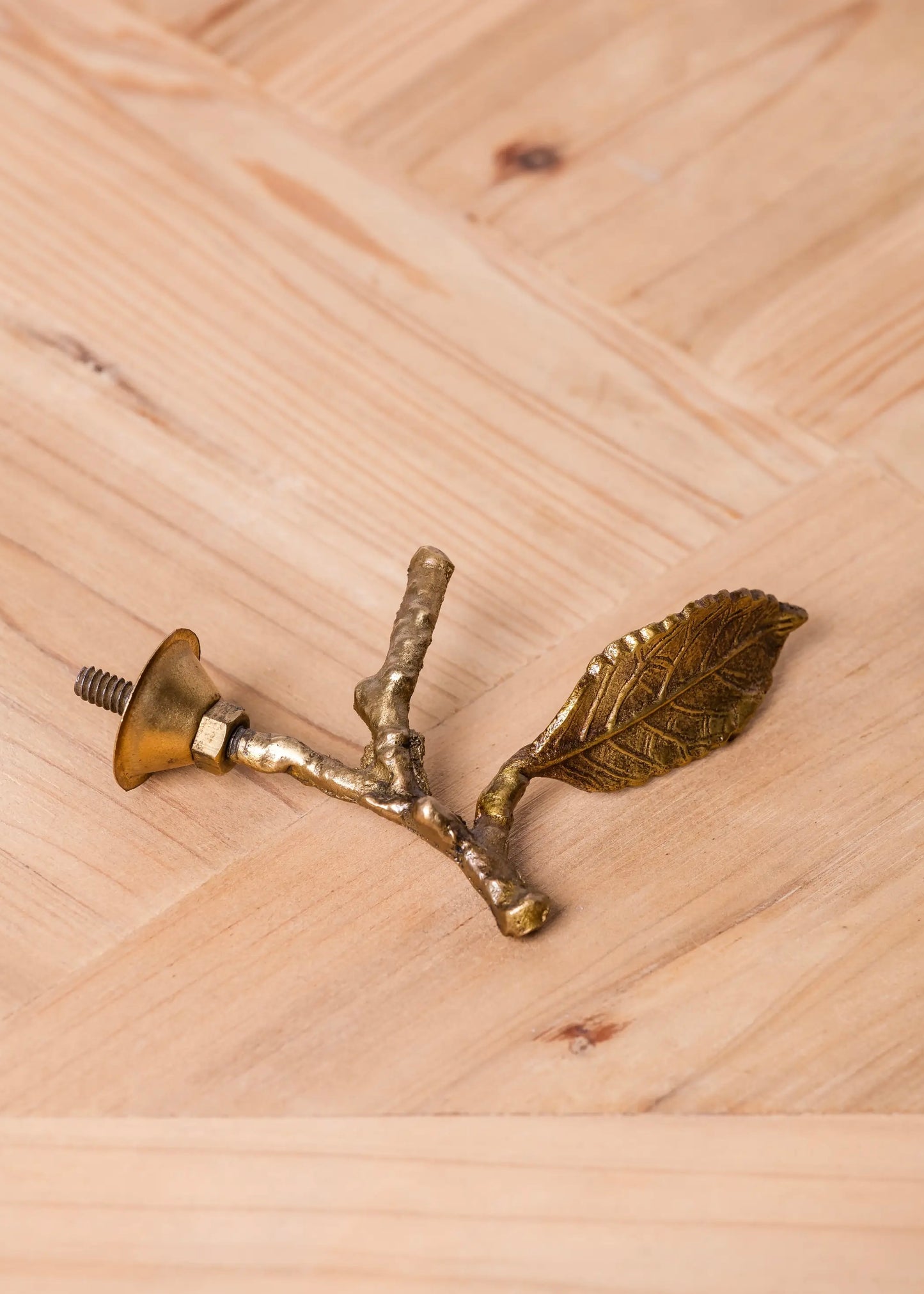 Branch knob brass patina