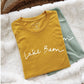 LAKE BUM Graphic T-shirt: BLACK / M