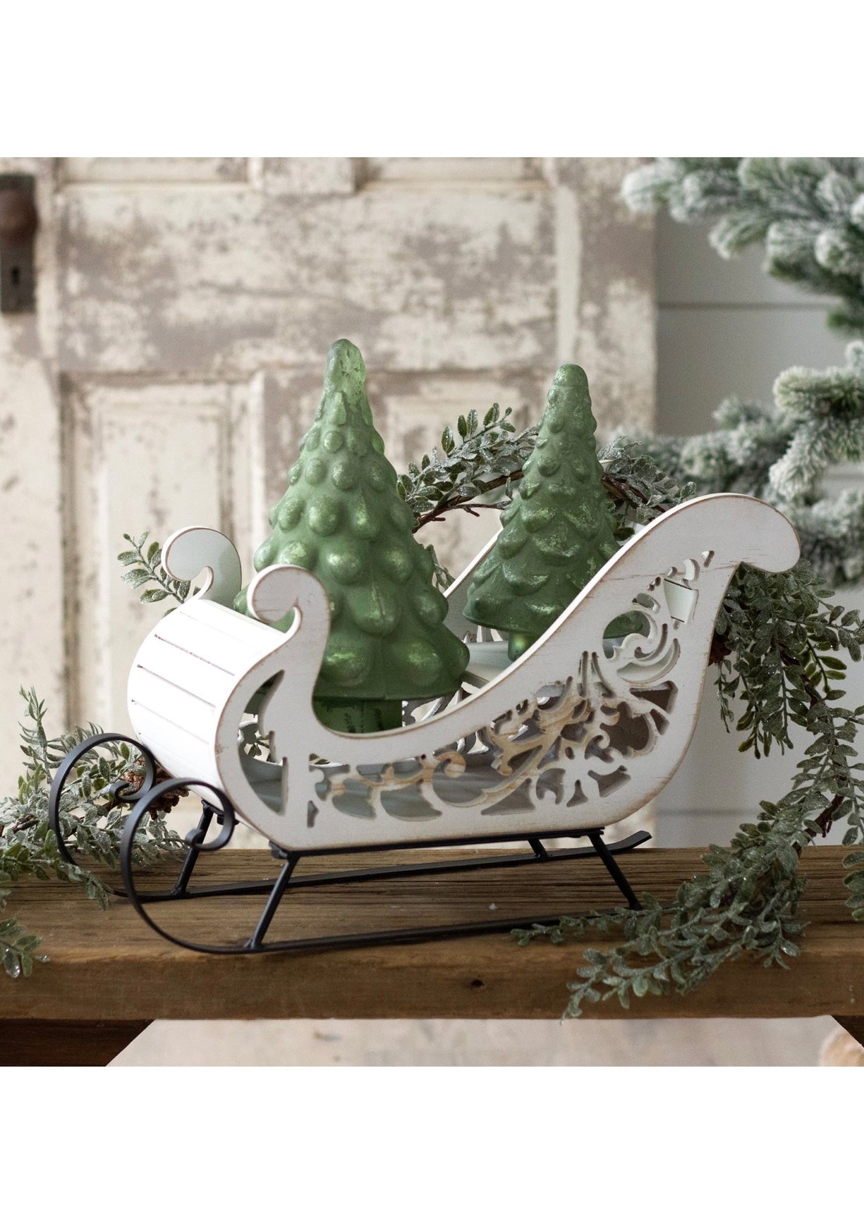 White Sleigh with Scroll Design